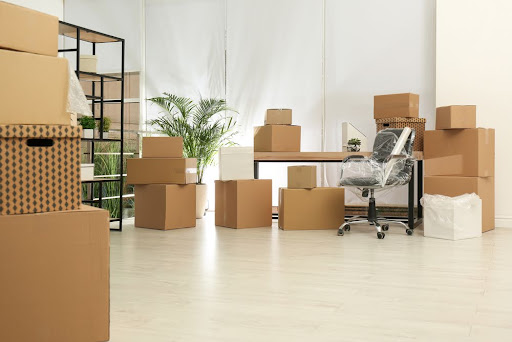 Office moving checklist - packing and sorting boxes.